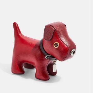Coach dog paperweight